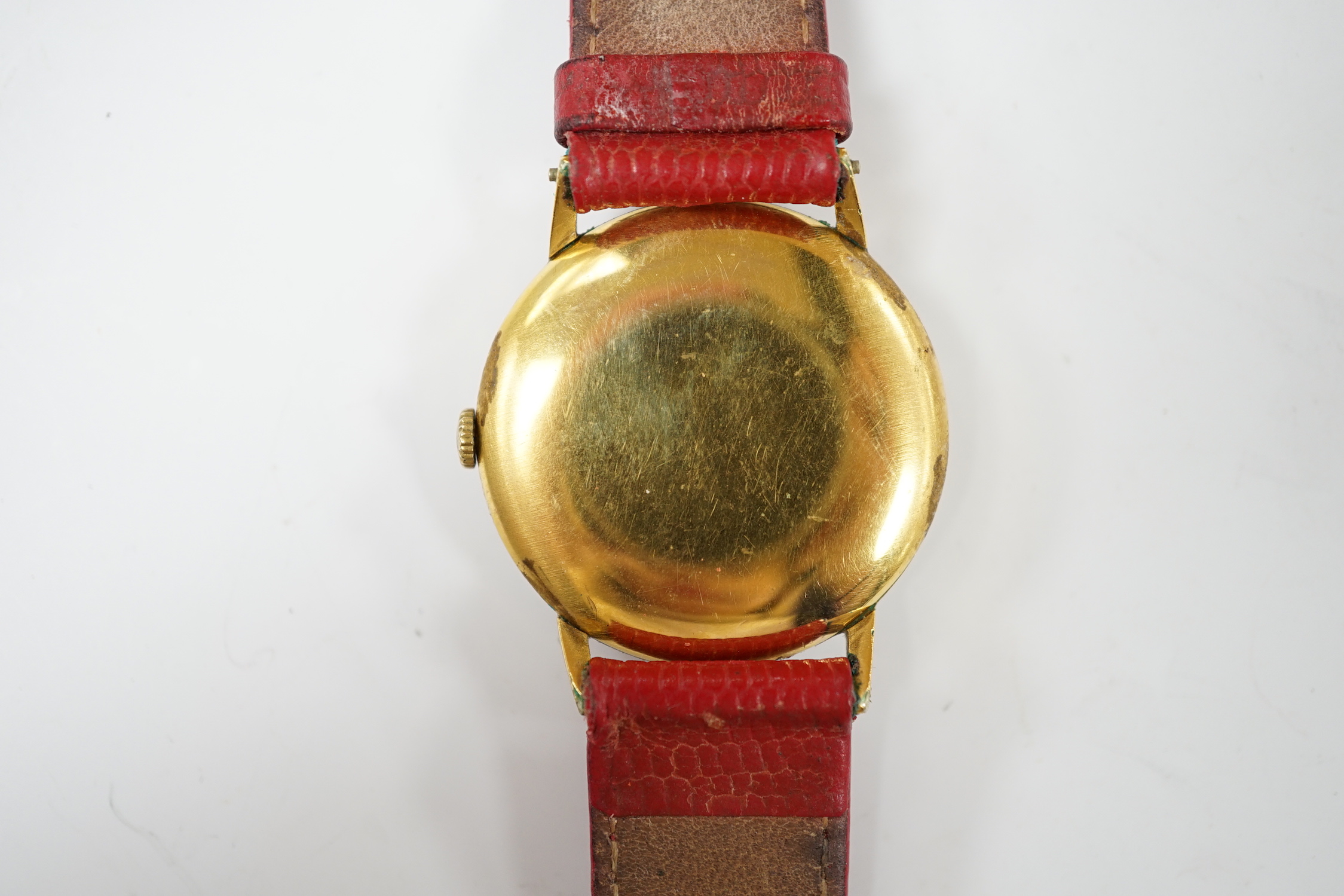 A gentleman's late 1940's gold plated Omega manual wind wrist watch, on associated leather strap, case diameter 32mm, no box or papers.